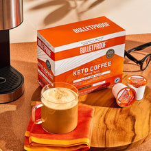 Load image into Gallery viewer, Keto Coffee Pods 24ct with cup of coffee
